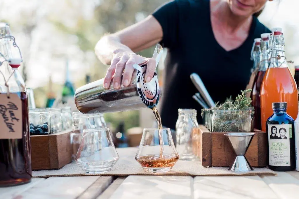 Bar Tender Pouring a drink