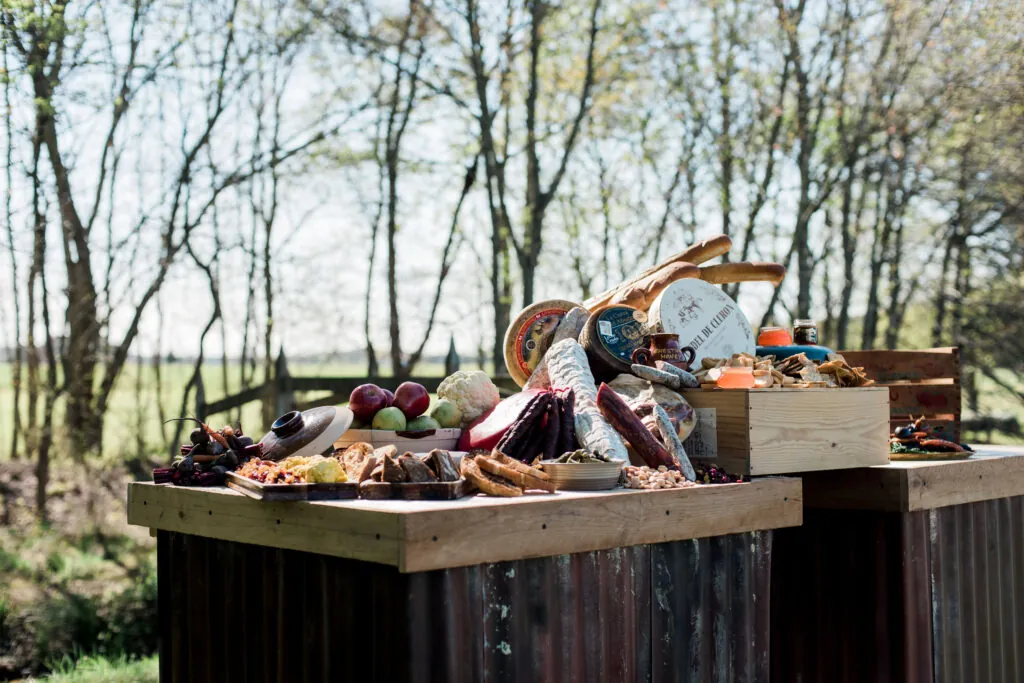 a pile of assorted items sitting on top of a wooden box